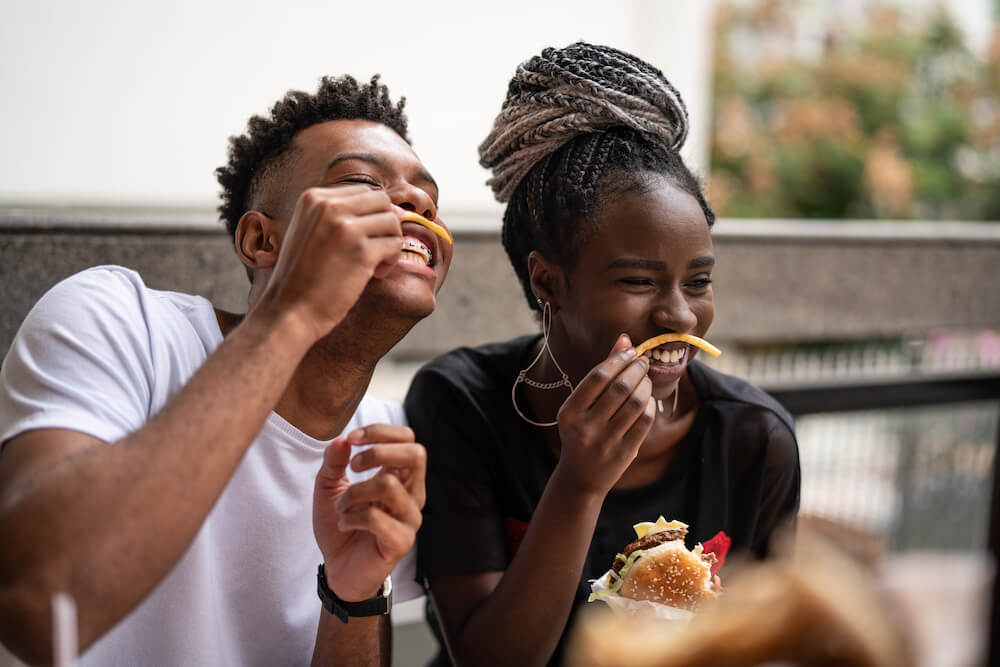 Teenagers eating fast food