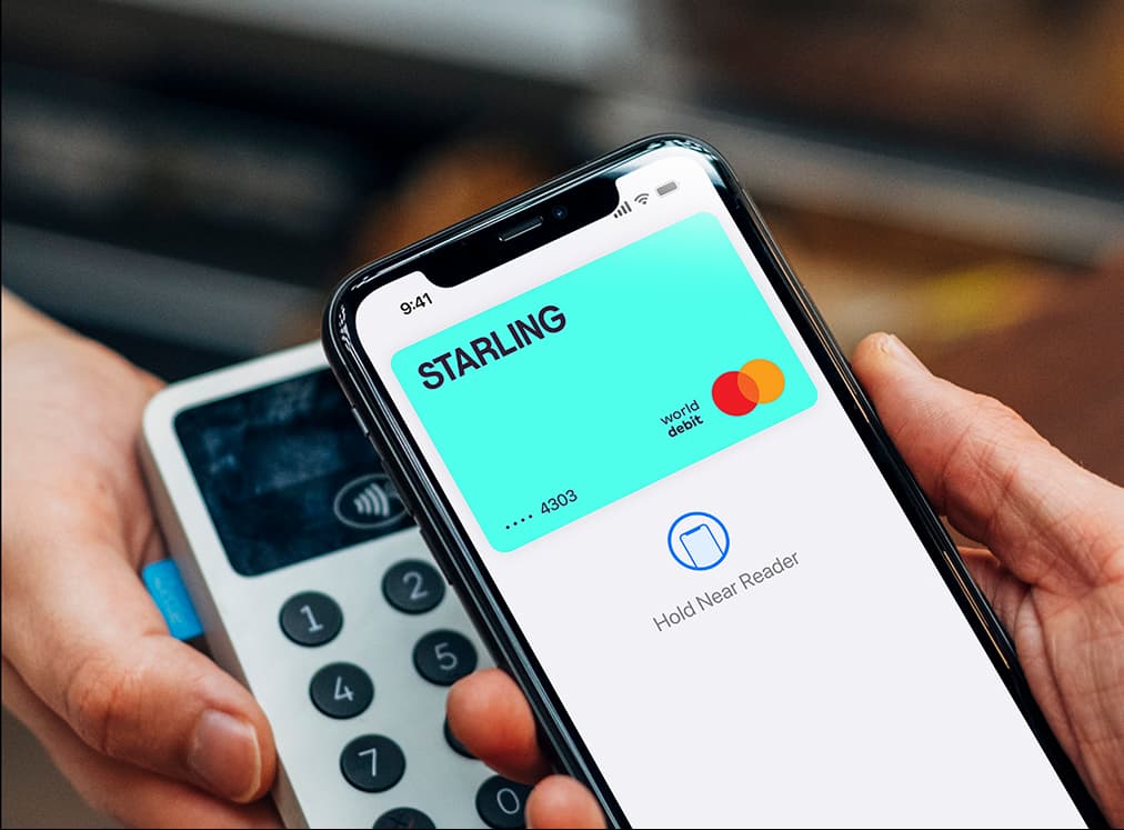 person paying via apple pay