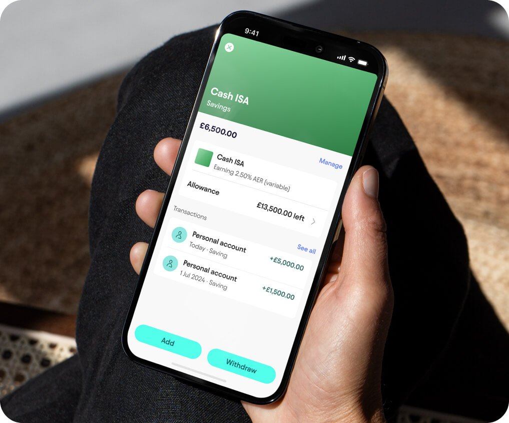 A person holding a phone showing their Cash ISA
