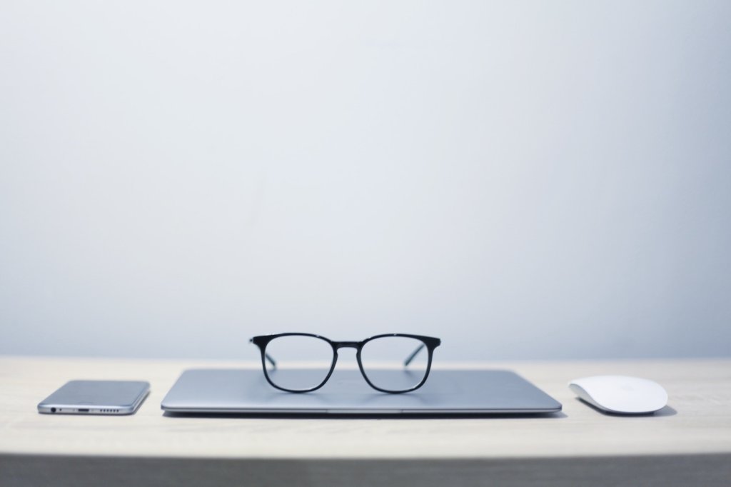 laptop and smartphone with glasses