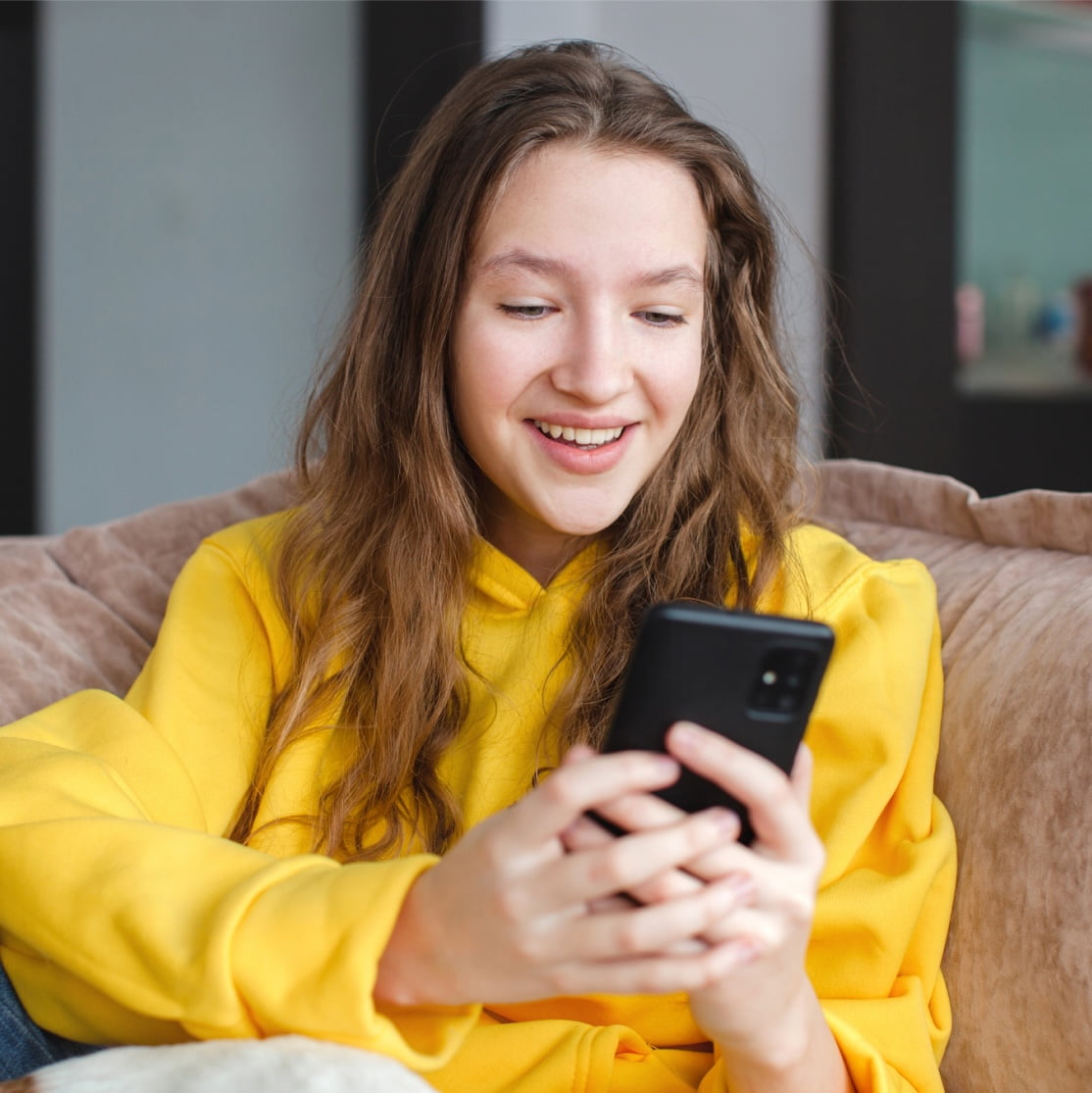 Girl looking at smartphone