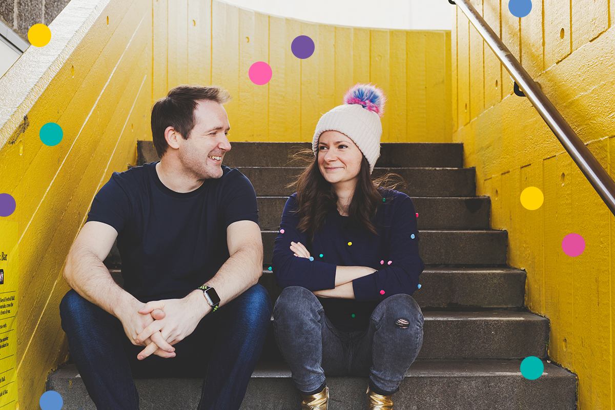 Steve Folland and Frankie Tortora sit on the stairs