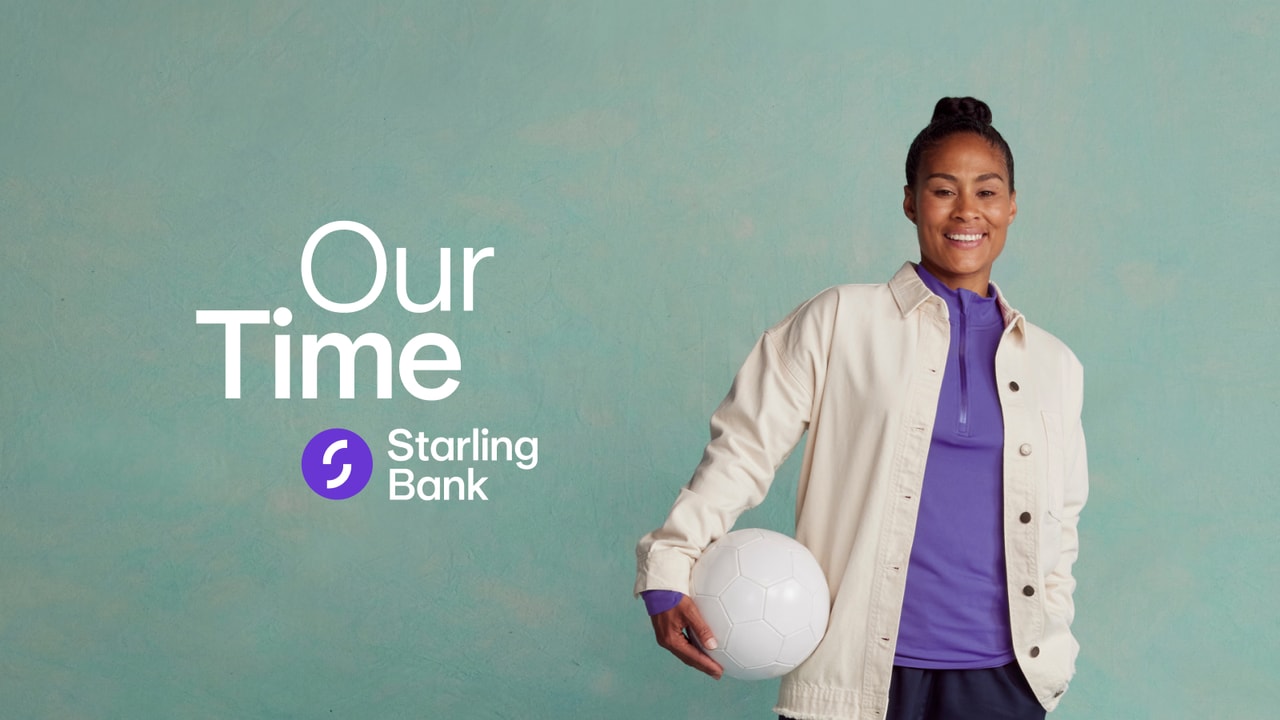 Rachel Yankey holding a football
