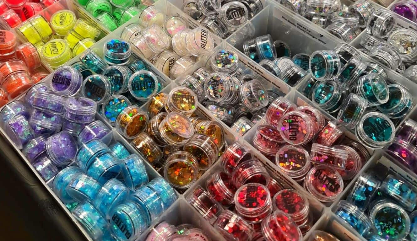 Tubs of different colour glitter