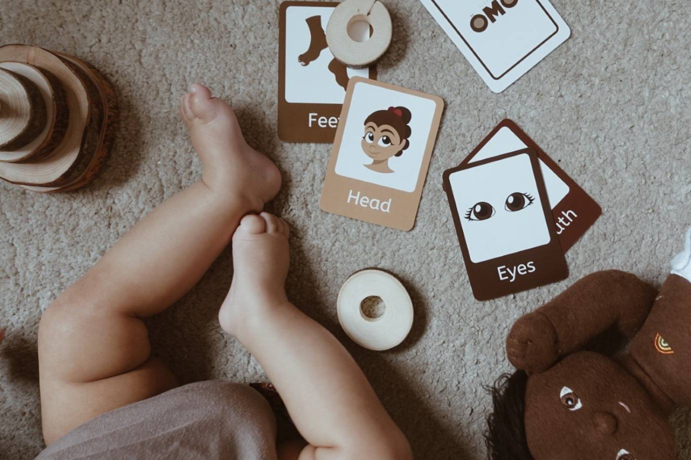 Educational flashcards on the floor