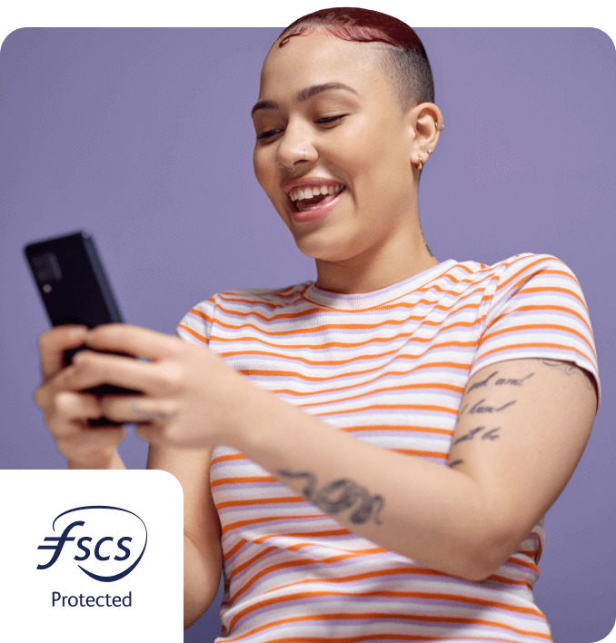 Lady smiling at her phone