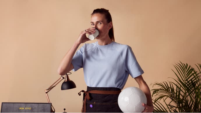 Jill runs a coffee shop alongside her football career