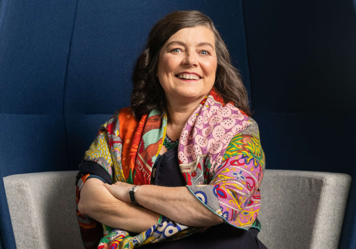 Portrait of Anne Boden sat in a chair