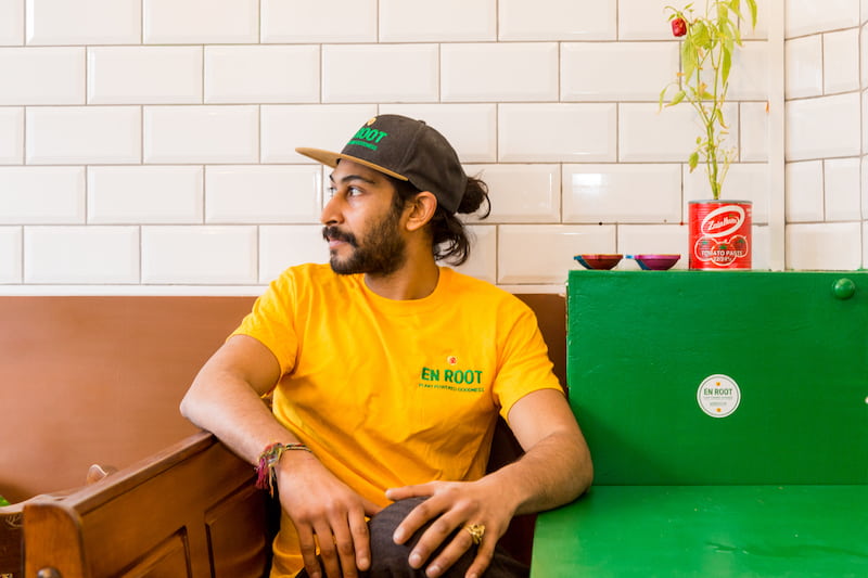 A portrait of Nish in his En Root uniform