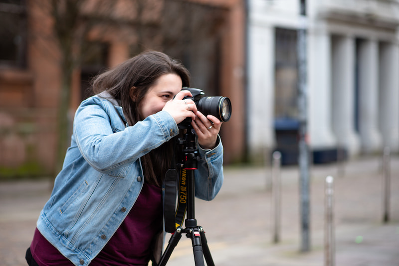 Lucy takes a photo